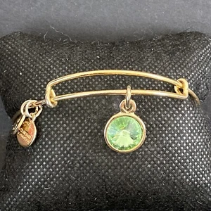 Brazalete ajustable vintage Alex Ani tono dorado brazalete claro diamantes de imitación verdes - Imagen 1 de 9