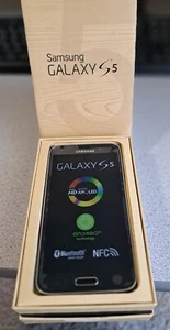Samsung Galaxy S5 T-Mobile 16GB 4GLTE Black -Unused in box- - Picture 1 of 3