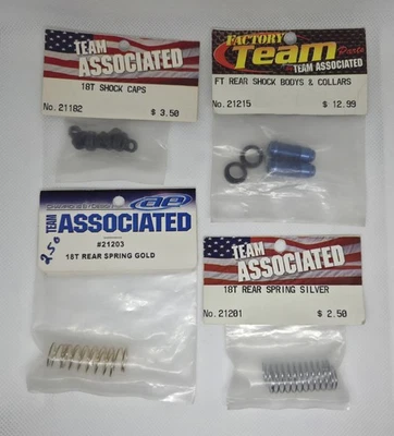 Team Associated ~ 4 Item Lot ~ Rear Shock Parts, Aluminum Bodies, Springs RC18T  - Image 1 of 4