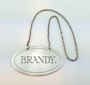 VINTAGE SILVER BRANDY DECANTER OR BOTTLE LABEL STAMPED SILVER 14.6g c1960/80s. - Picture 1 of 5
