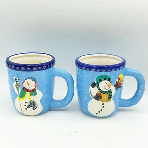 2er Set Blaue Schneemänner mit Vögeln Tassen WMG 2012 - Bild 1 von 6