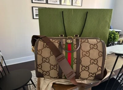 Autêntica bolsa de viagem Gucci unissex Jumbo GG grande lona e couro bege - Imagem 1 de 4