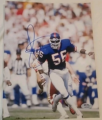 LAWRENCE TAYLOR SIGNED 8X10 PHOTO NEW YORK GIANTS HOF PSA/DNA AUTHENTIC #AP33206 - Image 1 of 2