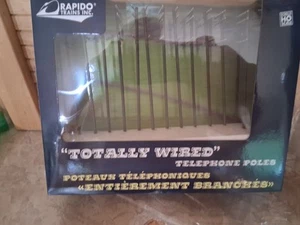 Rapido Ho Scale #300001 Totally Wired Telephone Pole Set 12 PCS - Picture 1 of 2
