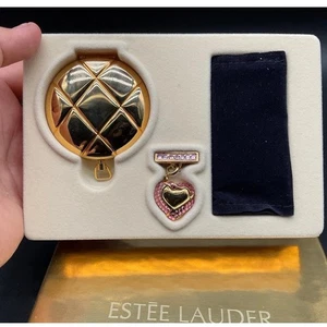 Estée Lauder Collectible Lucidity Compact Gold Quilted with Pink Heart Charm NIB - Picture 1 of 4