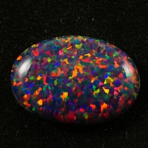 Cabujón ovalado de ópalo de fuego negro 14x10 mm 3,5 quilates AAA+ piedras preciosas sueltas australianas - Imagen 1 de 4