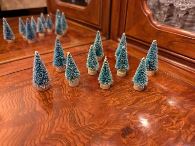 Ten 2 3/8" & 2" Tall Bottle Brush Evergreen Snow-tip Trees w/ Natural Wood Bases - Image 1 of 4