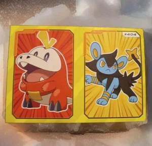 2022 POKEMON POKEDEX GIGAMAX Sticker #059 FUECOCO / LUXIO PERU Edition - Bild 1 von 2