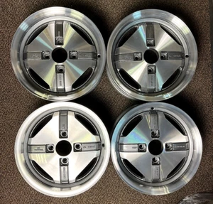 SET (4) Nissan Skyline C210 R30 R31 Laurel C230 factory mags JDM R14x5.5J et 25 - Foto 1 di 12