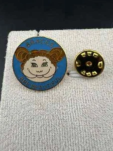 Cuddle Craft Vintage Braces Are Beautiful Blue Gold Round Pin 1985 - Picture 1 of 3