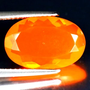 2.65 ct Flashing Oval Cut (14 x 9 mm) Heated Orange Fire Opal Loose Gemstone - Picture 1 of 2