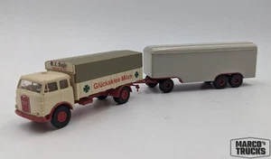 Brekina MAN 10.212 Trailer truck „Glücksklee Milch“ Conversion 1:87 /BRU701 - Picture 1 of 1