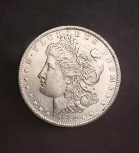 1884-O *Brillante non circolato* Morgan Silver Dollar (piume seno intero) - Foto 1 di 2