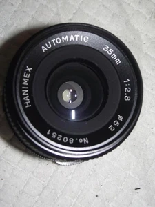 OBIETTIVO GRANDANGOLARE HANIMEX 35MM F2.8 PER ATTACCO A VITE M42 PENTAX - Foto 1 di 3