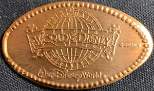 RETIRED! COPPER! WORLD OF DISNEY LOGO - DISNEY SPRINGS WDW PENNY - Picture 1 of 2