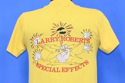 Camiseta vintage anos 80 LARRY ROBERTS EFEITOS ESPECIAIS MASTERS OF THE Universe pocket P - Imagem 1 de 4
