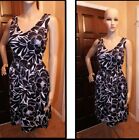 London Times Black & White Floral Cocktail Dress sz 10. Has stretch and pockets.