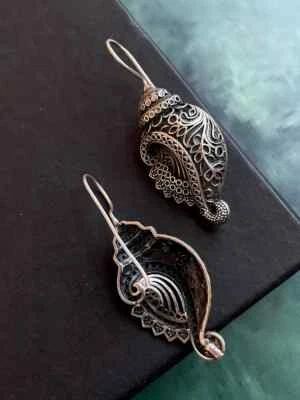 Shell Shape Black Polish artisanal Look antique Stud Earring - Image 1 of 3