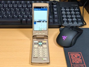 au Kyocera KYF32 Gold Mobile Japanese Flip phone Garakei Keitai Cell phone Rare - Picture 1 of 24