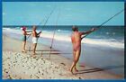Surf Fishing Along Miles Of White-Capped Waters In Sunny Tropical Florida