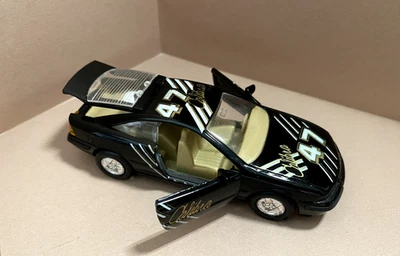 Welly Opel Calibra, escala 1:32, tirar hacia atrás, fundido a presión, 9041, negro, raro, en muy buena condición. Foto 1 de 4