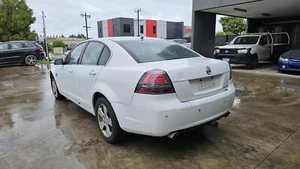HOLDEN COMMODORE VE 08/2006-05/2013 REAR BUMPER W/ REVERSE SENSOR TYPE SEDAN - Picture 1 of 12