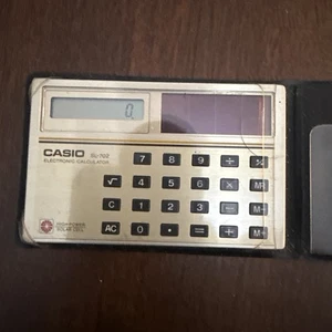 Casio SL-702 Solar Electronic Calculator Vintage Slim Pocket Model Works - Bild 1 von 4