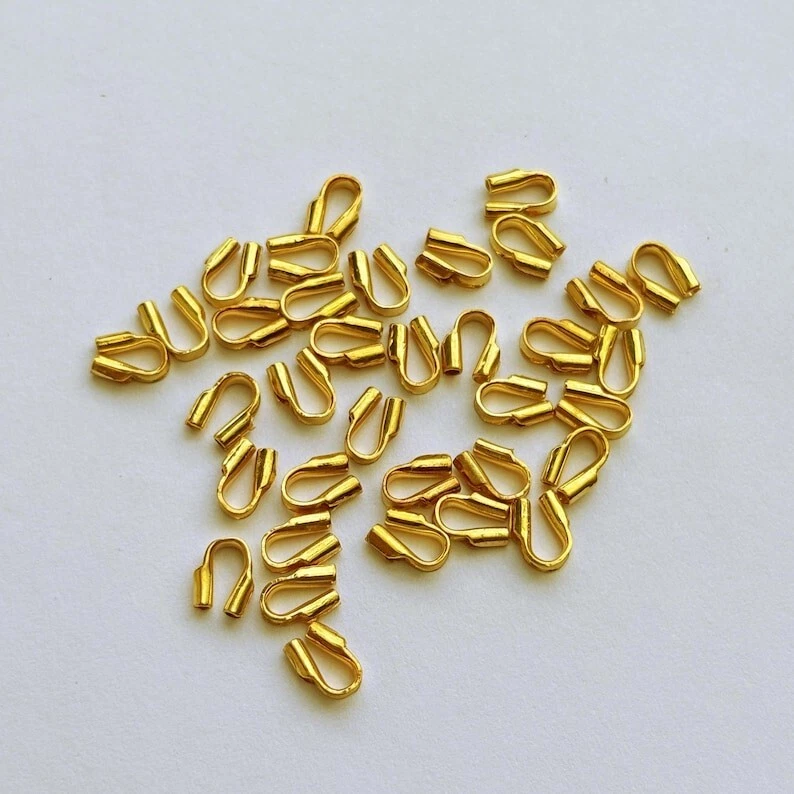 Protector de cubierta de alambre de oro amarillo macizo de 14 k con cuerdas 0,6 mm 10 piezas Foto 1 de 3