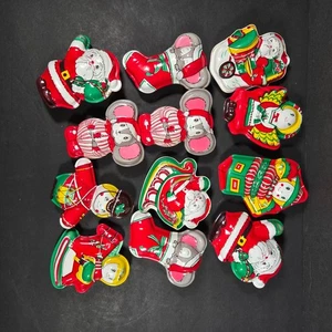Lot 12 Vintage Embossed Plastic Tin Christmas Container Santa Mice Stocking 3 in - Picture 1 of 11