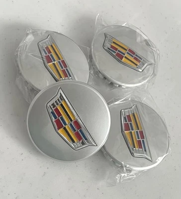 4x Tapacubos centrales de rueda coloridos plateados Cadillac (ATS CTS DTS SRX STS XLR XTS) 67 mm Foto 1 de 4