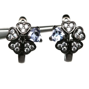 925 Sterling Silver 4 x 4 mm. Blue Tanzanite & White Zircon Earrings - Picture 1 of 4