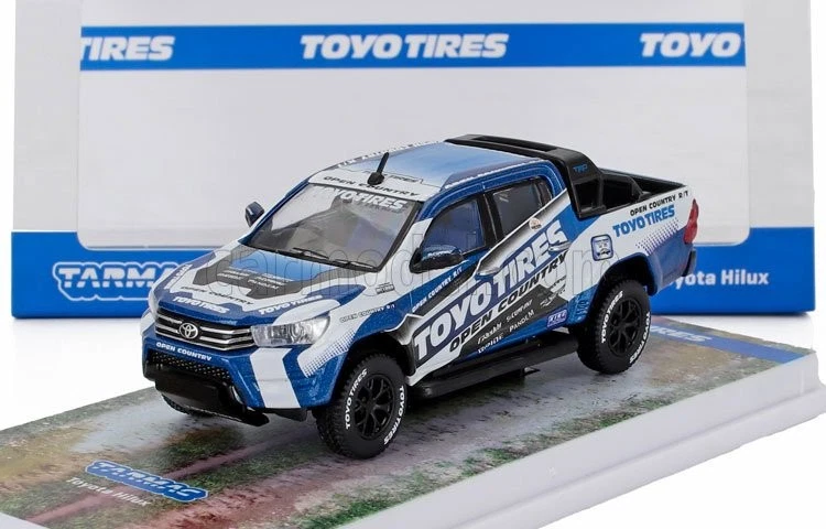 1/64 TARMAC - TOYOTA - HILUX PICK-UP TOYO TIRES LIVERY 2021 T64-041-TOYO - Immagine 1 di 1