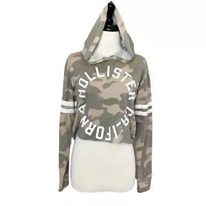 Hollister Damen/Junioren tarnfarben mit Kapuze kurz geschnitten Grafik-T-Shirt Größe S grün beige - Bild 1 von 7