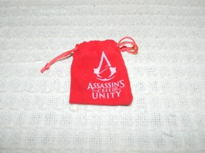 2014 Loot Crate Assassin's Creed Unity Coin w/ Red Velvet Pouch - Image 1 of 4