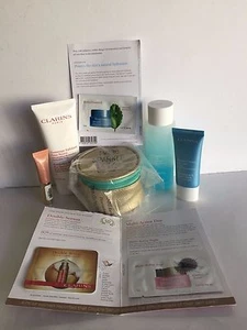 Clarins 5 Piece Skincare Set ~ With Makeup/Jewelry Pouch ~ No Exfoliator ~ NEW - Picture 1 of 9