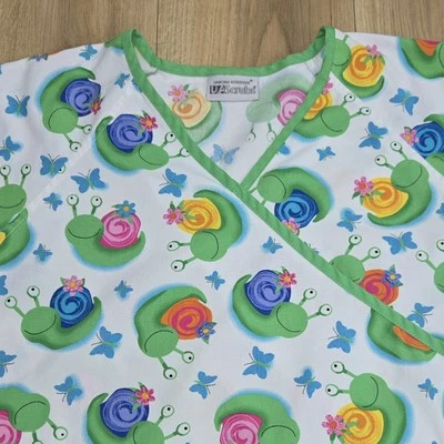 UA Exfoliantes Primavera Caracol Estampado Mujer Talla Mediana, Cuello en V, Bolsillos, Elástico  Foto 1 de 4