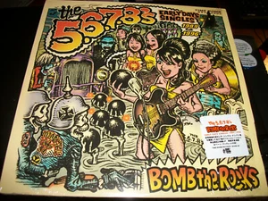 The 5.6.7.8's ‎– Bomb The Rocks: Early Days Singles 1989 - 1996 - 2LP - 2003 - T - Imagen 1 de 4