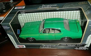 MOTORE SCALA 1/24 MAX GREEN 1969 PONTIAC GTO GIUDICE CLASSICI AMERICANI IN SCATOLA - Foto 1 di 3