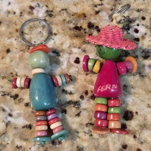 31/2" & 33/4" Vintage Bakelit Spielzeug Perlen hängende Puppe Krippe Spielzeug Spielzeug "Fern" - Bild 1 von 5