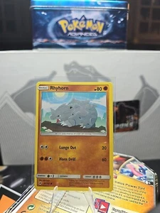 Pokémon TCG Rhyhorn Burning Shadows 65/147 Regular Common - Bild 1 von 2
