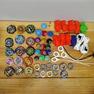 Beyblade Konvolut Tomy Hasbro 58 Teile - Bild 1 von 24