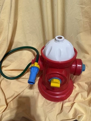 Manguera de juguete de agua de 3 vías para rociador con boca de incendios Fisher Price Fun de colección años 90’s Foto 1 de 4