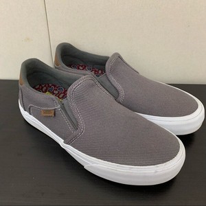 grey slip on vans