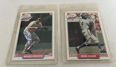 Lot of 2 Baseball Cards Autographed LE Brooks Robinson and Ernie Banks 1993 COA - Image 1 of 4