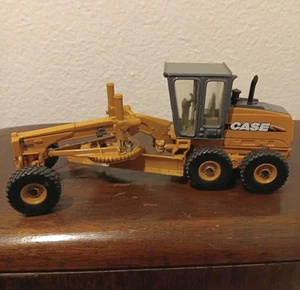 Ertl 1/50 Scale 14409 - Case Construction 885 Grader - Dk. Orange No headlights  - Picture 1 of 13