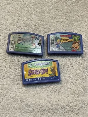 LeapFrog LeapPad, Leapster Explorer -3x Game Cartridges, Scooby Doo Plus More - Image 1 of 4