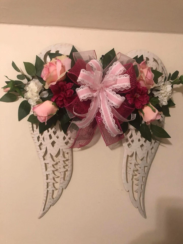 Alas angulares con flores Foto 1 de 1