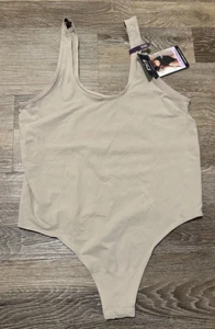 Maidenform Body nahtlos glättend Tanga Druckknopfverschluss Blush XXL MSW001 - Bild 1 von 3