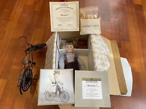 The Ashton-Drake Galleries Paperboy "Kenny" on Bicycle Porcelain Doll CIB w/ COA