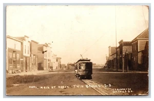 Twin Brooks South Dakota RPPC ~ Main street Exaggeration ~ C. C. Slack - Picture 1 of 2